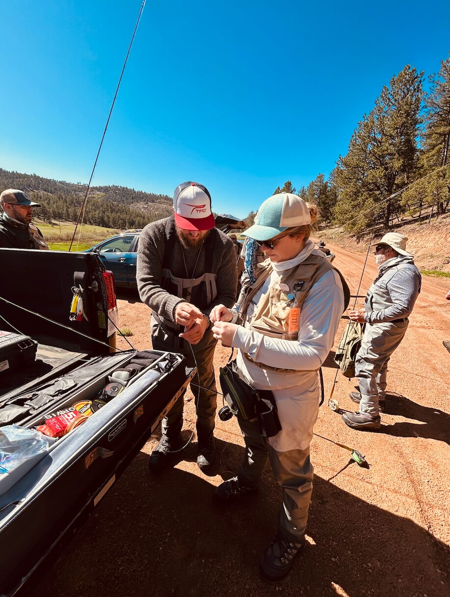 Anglers rigging up for the TFO Fly Fishing school